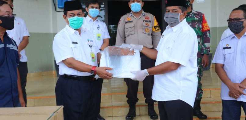 Peduli Penanganan Covid 19 di Siak, BOB dan PT. Anugerah Tani Makmur Bantu Masker dan APD.