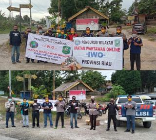 Polres Siak Bersama PW IWO Riau Dan PD IWO Siak Bagikan 3000Â  Masker Secara Gratis