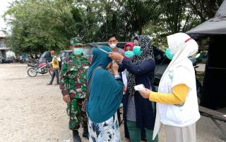 Pendisiplinan ProkesTerus Dilakukan Babinsa Koramil 09/Langgam Bersama Polri dan Tim Kesehatan