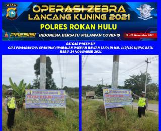 Operasi Zebra LK 2021, Satgas Polres Rohul Pasang Sepanduk di Daerah Rawan Laka