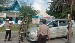 Koramil 09/ Langgam dan Aparat Kepolisian Bersama Berikan Penjelasan Larangan Mudik